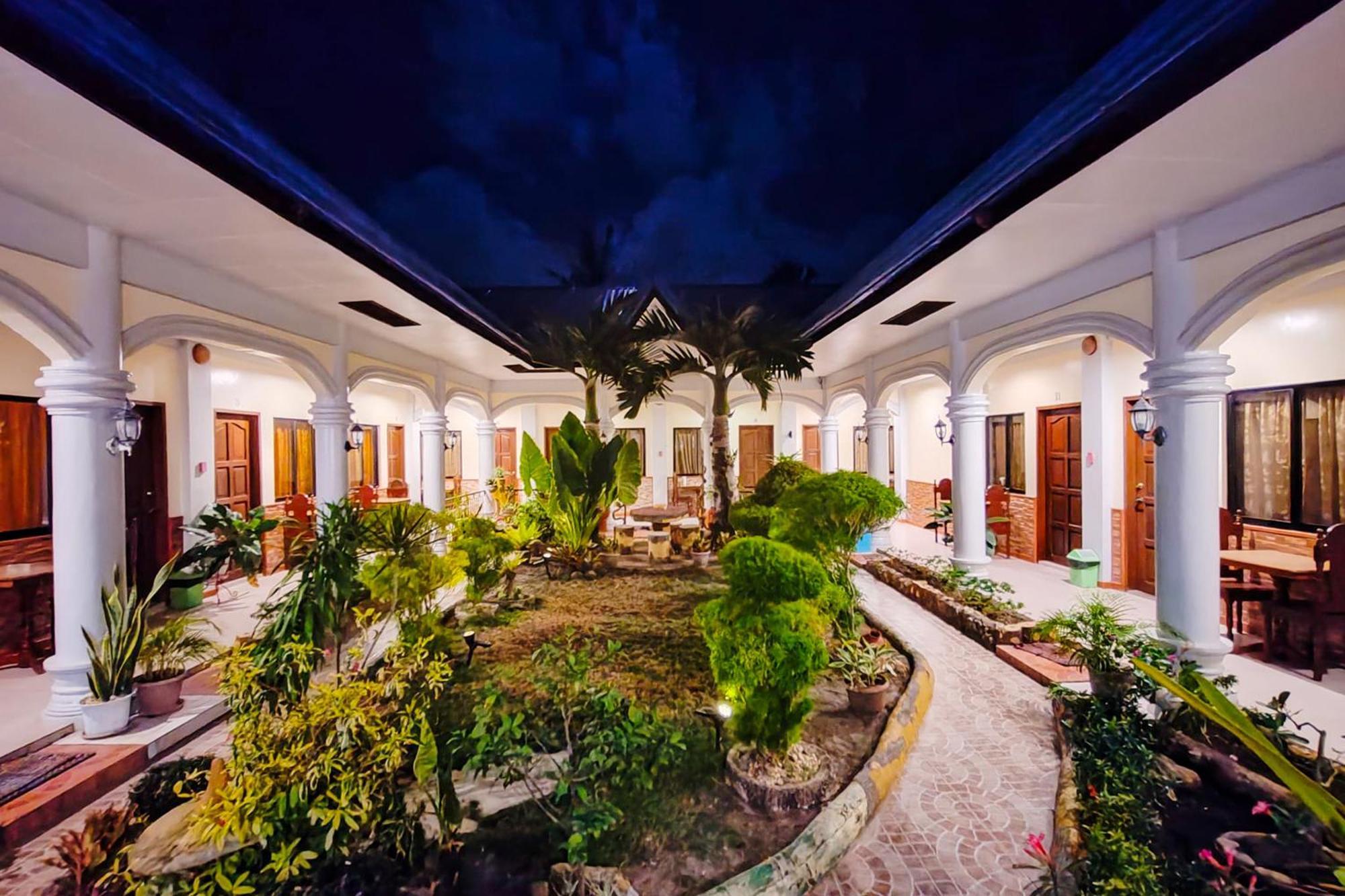 Mbg Travellers Inn Powered By Cocotel Puerto Princesa Exterior foto